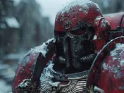 Red power armour caked with wet snow, the faceplate and shoulder trim picked out in dark steel
